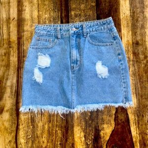 Light wash blue denim mini skirt for sale